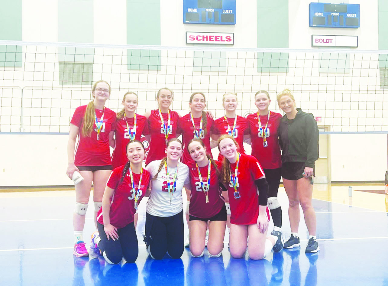 Klarissa Yu 26 and her Crossfire Volleyball team wins medals after playing in the Rochester Cup. 