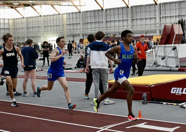 Bennett running at the University of Minnesota indoor track