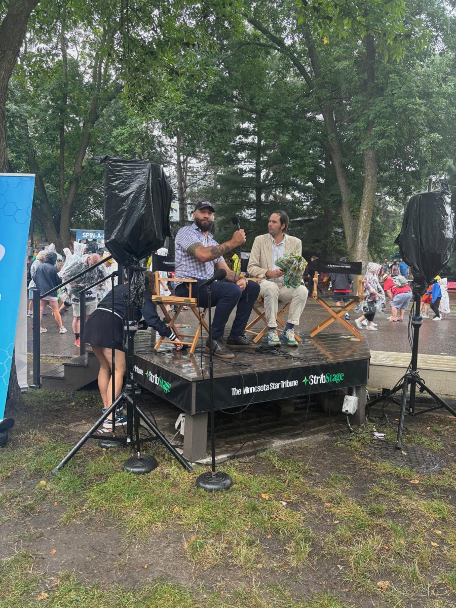 Republican Senate Candidate and ex-NBA Player Royce White (left) spoke with The Minnesota Star Tribune agriculture reporter Christopher
Vondracek (right) in an interview at the Minnesota State Fair on Aug. 22.