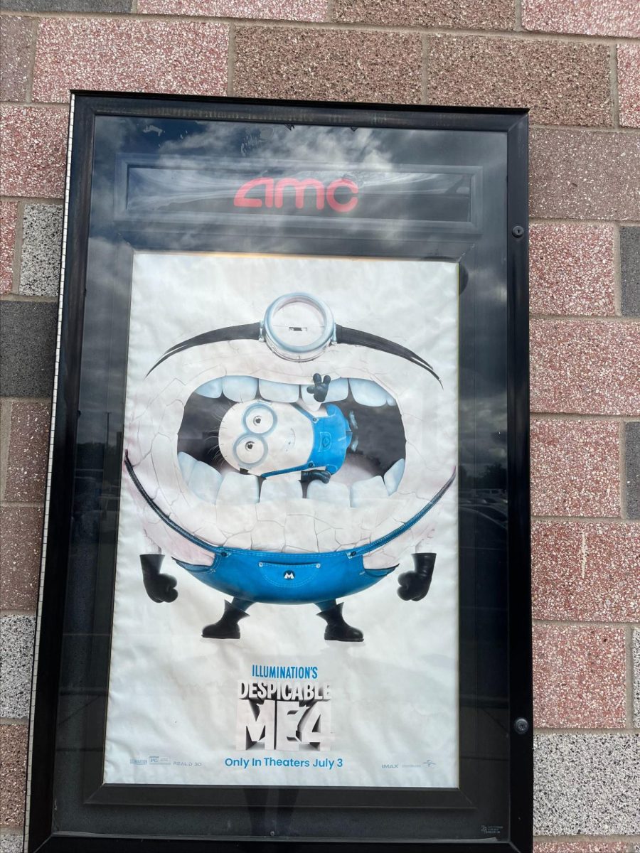 The poster for the film sits outside an AMC theater.