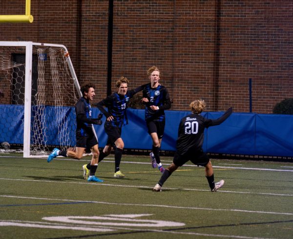 Silvestri, Brown, Bell, and Greg Perepelistyn ‘27 celebrate after Bell scored the game-winning goal against DeLaSalle at home in the Section semifinals on the night of Oct. 15.