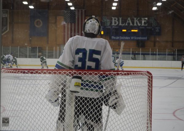 Aafedt watches the teams battle for the puck in the neutral zone. Aafedt had 24 saves in his first victory of the season. 