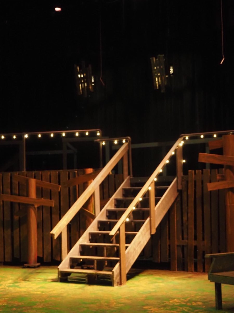 The set, designed by Erica Zaffrano, changed throughout the show with the help of the cast.