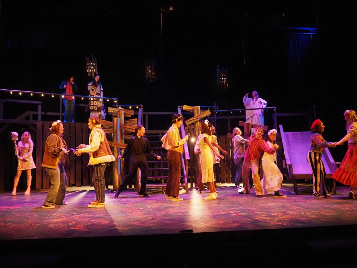 The cast dances at the end of the show, celebrating the weddings that just took place.