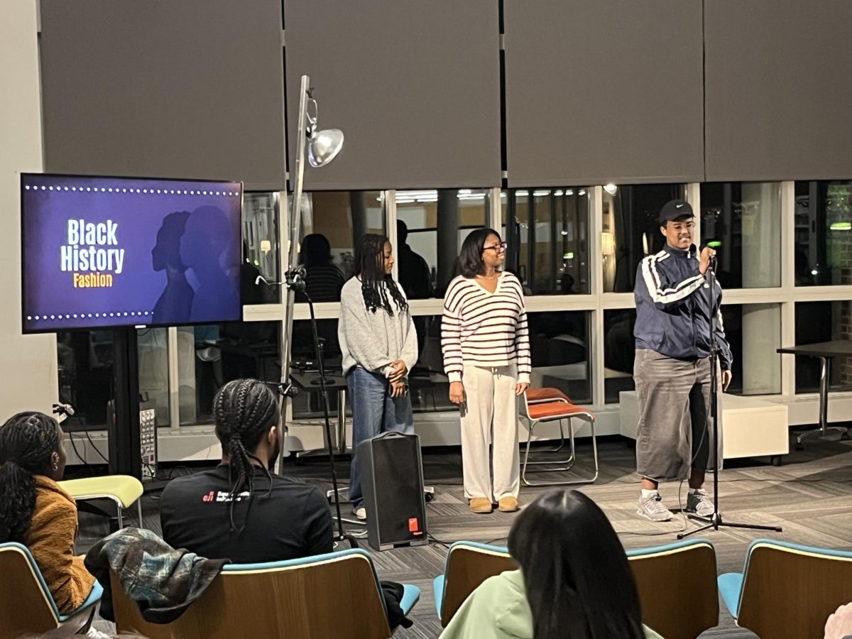 Chizoro Nwokocha ‘25, Michelle Elliott ‘25, and Shucayb Harir ‘26 presented on Black fashion figures during the Black History Month event on February 20 in the Carlson Commons.