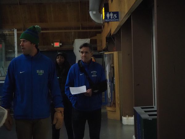 McClanahan (right) walks to the locker room after the first period of the Bears’ home opener against Mounds View alongside Wyman and athletic trainer Aubrey Dudley. Wyman, who has been involved with the team since 2015, was recently named McClanahan’s successor. “Blake Hockey has played a pivotal role in my life. I am honored and excited to be leading this program into the future. Thank you to the Blake community for entrusting me with this responsibility. I am excited and look forward to the challenge,” he said.